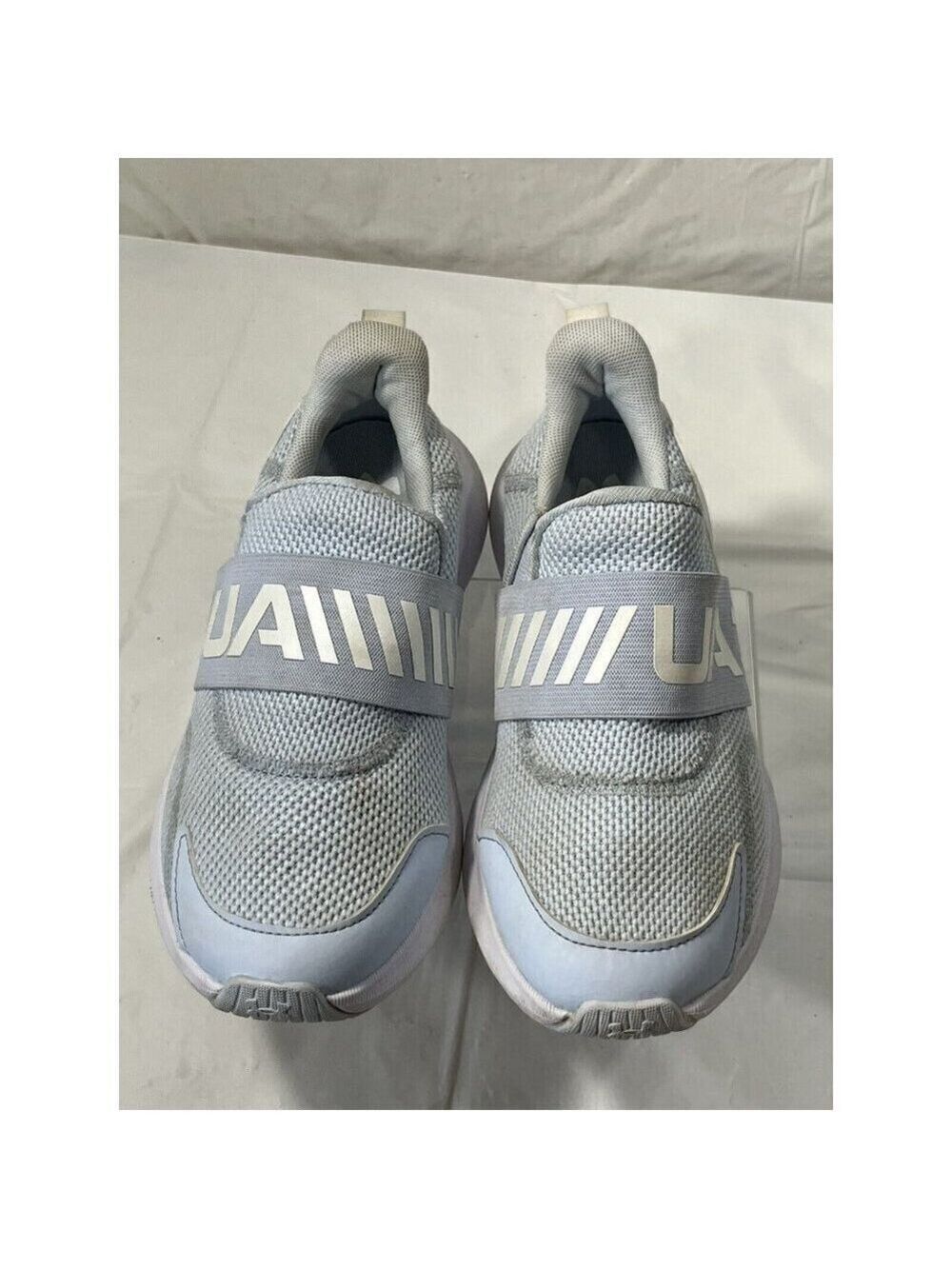 Under Armour Surge  Slip Gs Running  size 4.5 Y